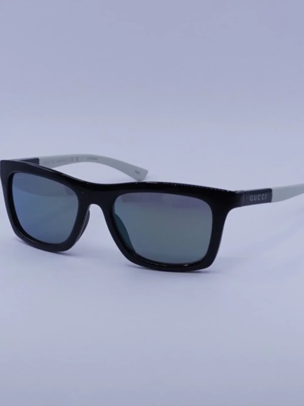 Gucci GG1735S 002 Sunglasses Black/White Rectangle Frame, Blue Mirror Lenses
